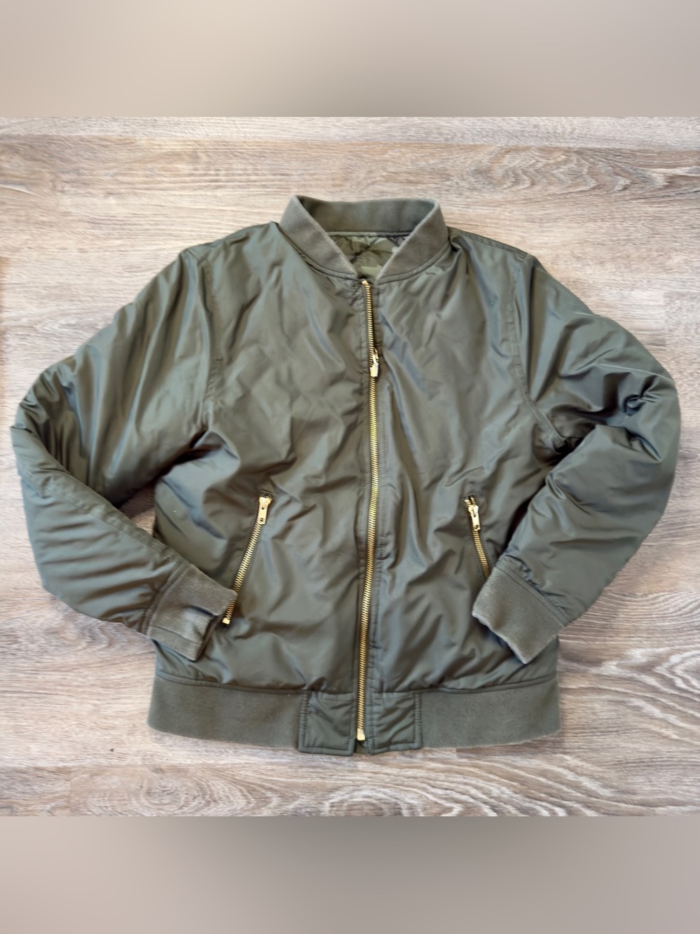 Gap SZ Sm Olive Green Bomber Jacket is reversible to camo. Excellent condition
